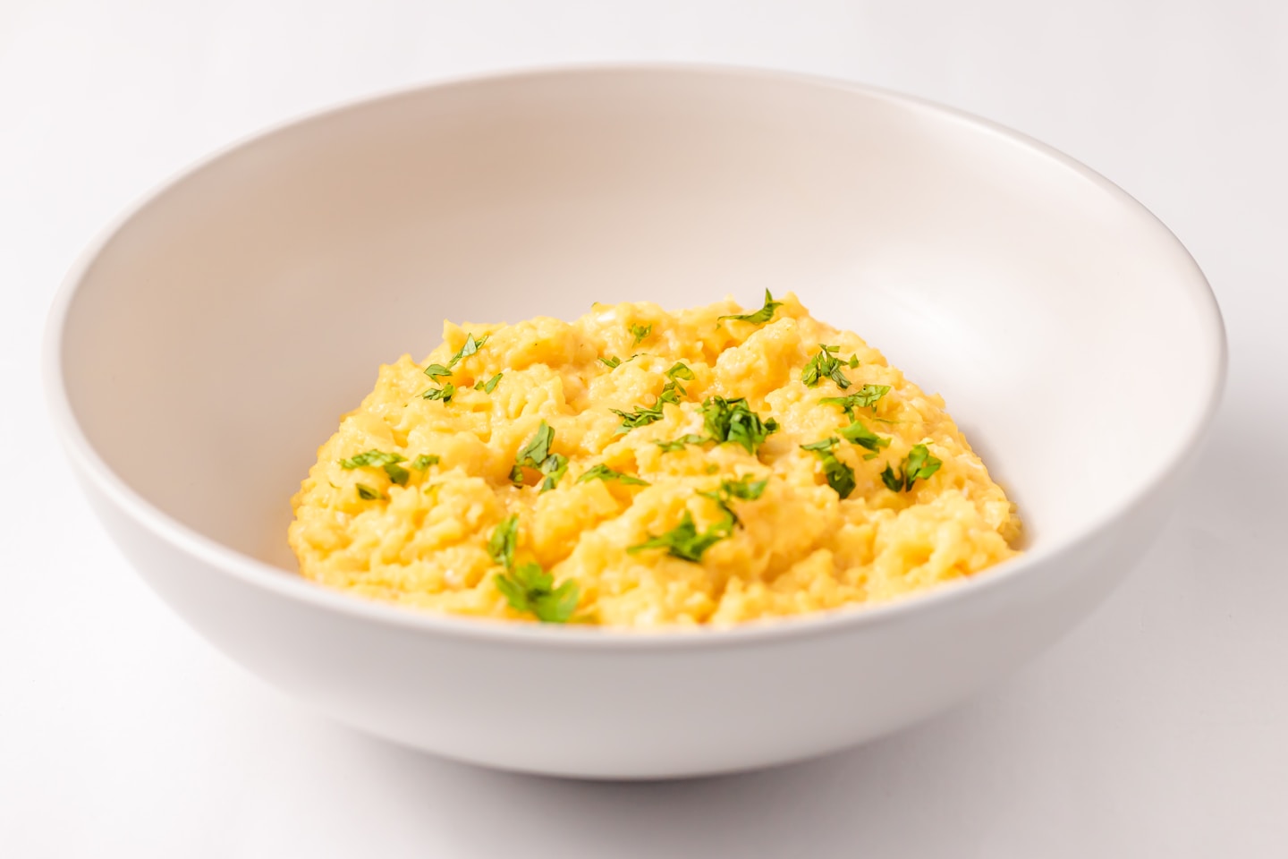 a close up of a bowl of food on a table